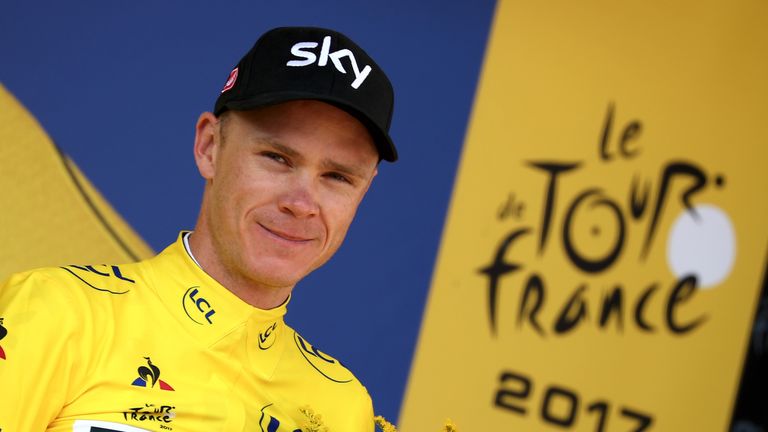 EMBRUN, FRANCE - JULY 21:  Christopher Froome of Great Britain riding for Team Sky in the leader's jersey poses for a photo on the podium following stage 1