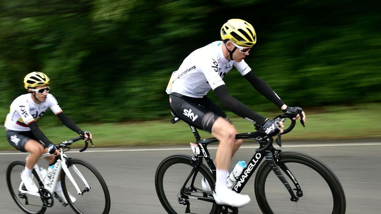 Great Britain's Christopher Froome (R) and Colombia's Sergio Henao ride during the 203,5 km second stage of the 104th edition of the Tour de France cycling