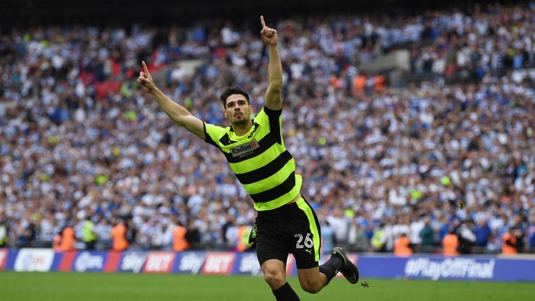Christopher Schindler of Huddersfield Town celebrates scoring the winning penalty in the shootout in the Sky Bet Championship play-off final