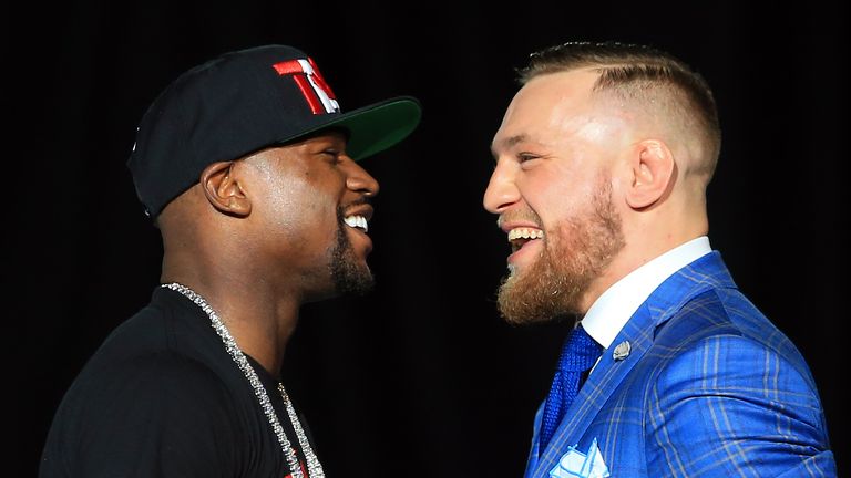 Floyd Mayweather Jr. and Conor McGregor faceoff during their World Press Tour in Toronto