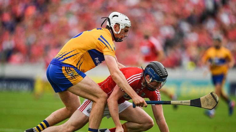 Conor Lehane of Cork is tackled by Connor O'Leary of Clare 