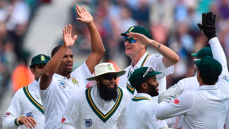 South Africa's Vernon Philander (2L) celebrates taking the wicket of England's Keaton Jennings for 0 runs on the first day of the third Test at The Oval