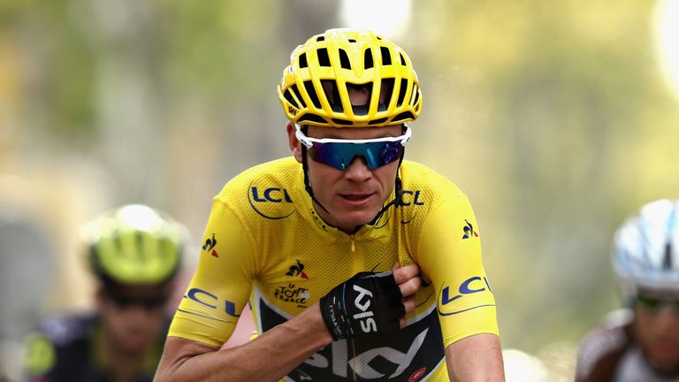 SALON-DE-PROVENCE, FRANCE - JULY 21:  Christopher Froome of Great Britain riding for Team Sky wearing the yellow leaders jersey crosses the finish line on 