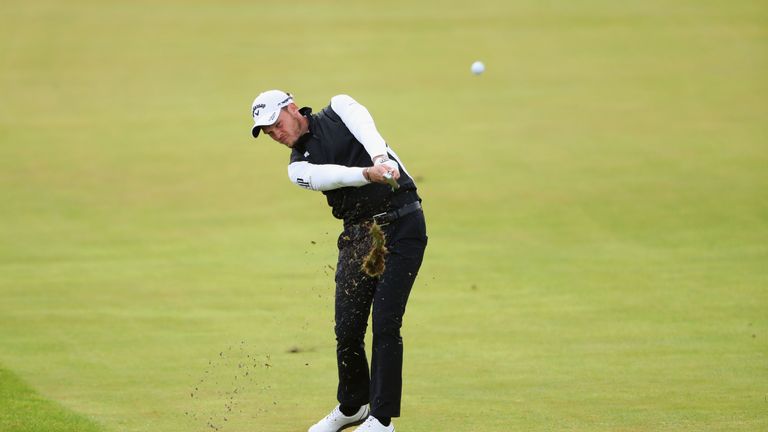 Danny Willett plays his second shot on the second hole during the first round of The Open