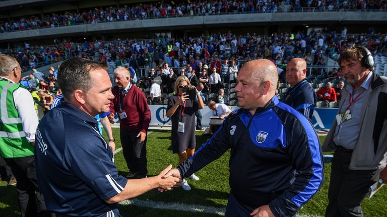 Wexford manager Davy Fitzgerald, left, shakes hands with Waterford manager Derek McGrath