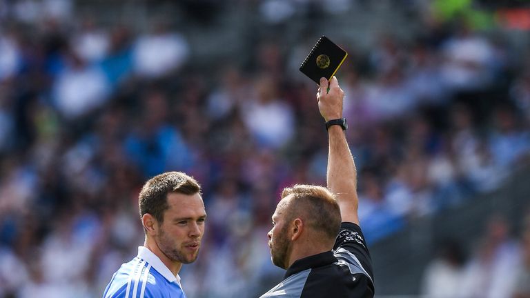 Dean Rock of Dublin receives a black card from referee Anthony Nolan in the 24th minute Leinster GAA Football Senior Championship Final match