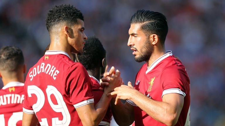 Dominic Solanke celebrates with Liverpool team-mate Emre Can