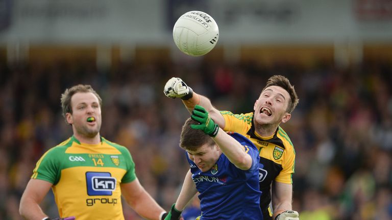 Mark Anthony McGinley of Donegal in action against Larry Moran of Longford during the GAA Football All-Ireland Senior Championship Round 2A match
