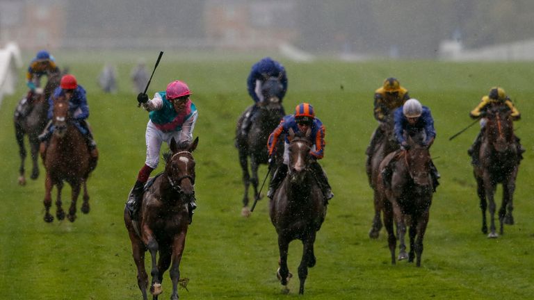 ASCOT, ENGLAND - JULY 29:  Frankie Dettori celebrates after riding Enable (L, pink cap) to win The King George VI And Queen Elizabeth Stakes at Ascot