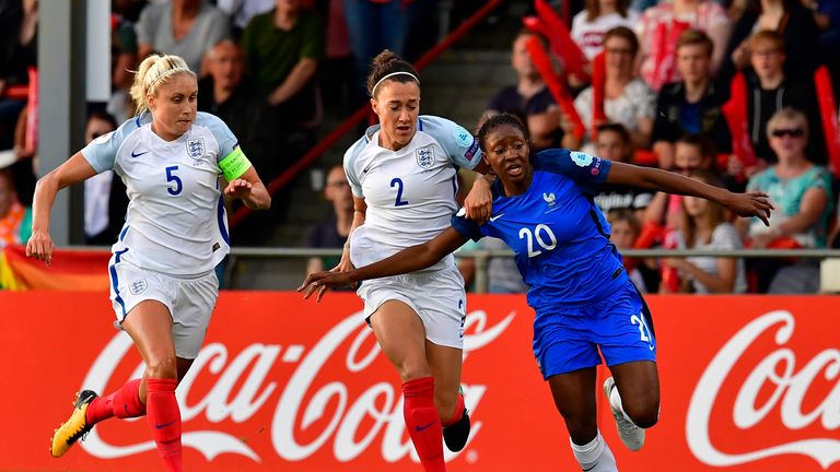 England's defender Stephanie Houghton (L) and England's defender Lucia Bronze vie with France's forward Kadidiatou Diani (R) during the UEFA Women's Euro 2