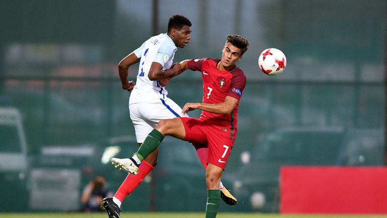 TBILISI, GEORGIA - JULY 15:  Dujon Sterling of England and Joao Filipe of Portugal battle for the ball during the UEFA European Under-19 Championship Final