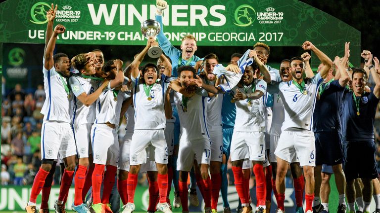 TBILISI, GEORGIA - JULY 15:  The England Team celebrate with the trophy after winning the UEFA European Under-19 Championship Final between England and Por