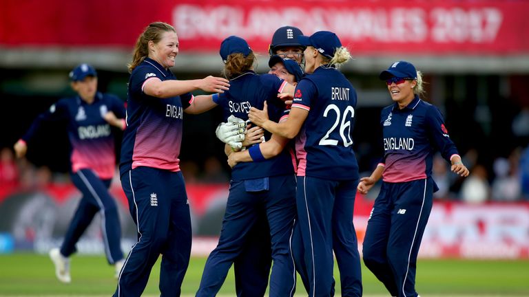 Anya Shrubsole of England celebrates with her teammates after dismissing Veda Krishnamurthy of India during the ICC Women's World Cup final