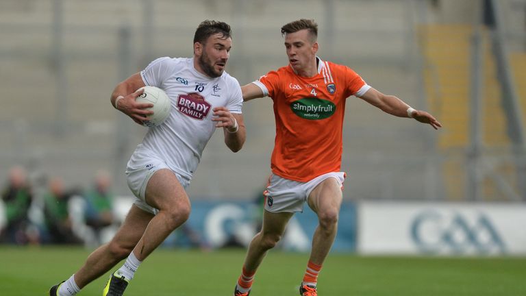 Fergal Conway of Kildare in action against Paul Hughes of Armagh during the GAA Football All-Ireland Senior Championship Round 4B match