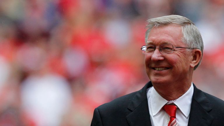 Sir Alex Ferguson of Manchester United gestures before kick off against Manchester City during the FA Community Shield football match at Wembley Stadium in