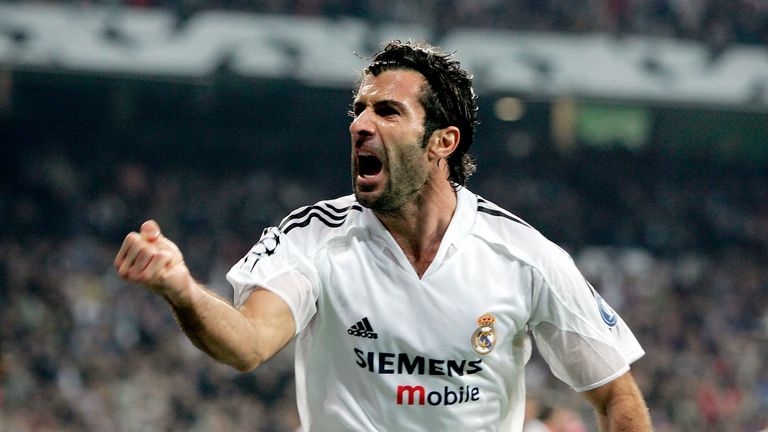 MADRID, SPAIN - NOVEMBER 23:  Luis Figo of Real Madrid celebrates the equaliser scored by Raul during the UEFA Champions League Group B match between Real 