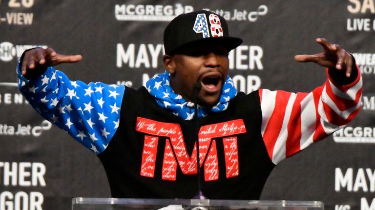Floyd Mayweather Jr. speaks about the upcoming fight against UFC fighter Conor McGregor during a press call at the Staples Center in  Los Angeles.