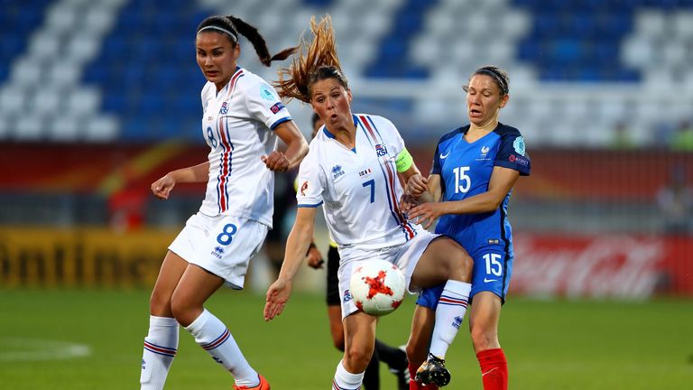 France's Elise Bussaglia (right) and Iceland's Sara Bjork Gunnarsdottir compete for possession