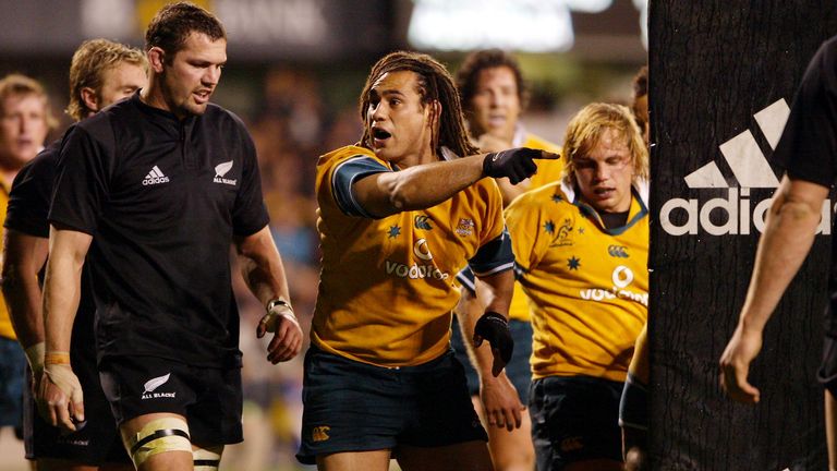 NEW ZEALAND - AUGUST 16:  Wallabies George Smith claims a try by team mate Stephen Larkham during the rugby test match between the All Blacks and Australia