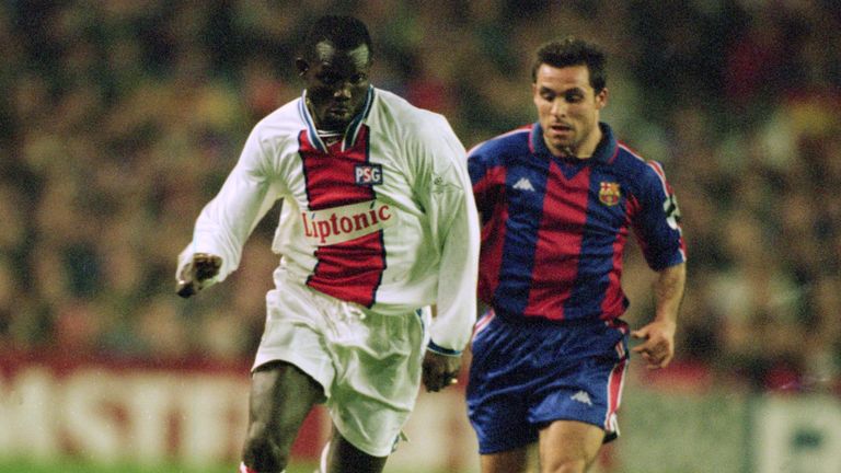 George Weah in action for Paris Saint-Germain against Barcelona