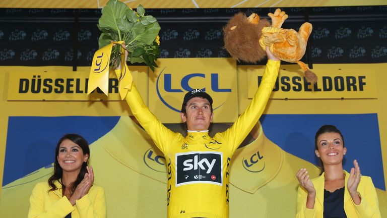 Team Sky's Geraint Thomas celebrates securing the yellow jersey following victory during stage one of the Tour de France
