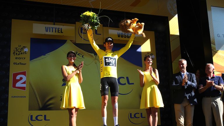 Geraint Thomas retained his yellow jersey despite a crash of his own on a chaotic fourth stage of the Tour de France