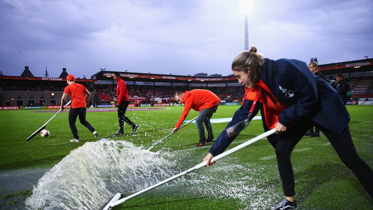 A waterlogged pitch led to the match between Germany and Denmark being postponed until Sunday