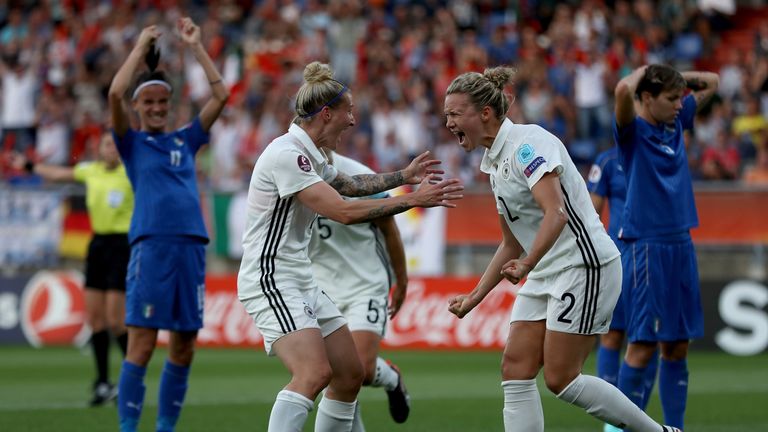 TILBURG, NETHERLANDS - JULY 21:  Josephine Henning #2 of Germany celebrate with team mate Anja Mittag after she heads the opening goal during the Group B m