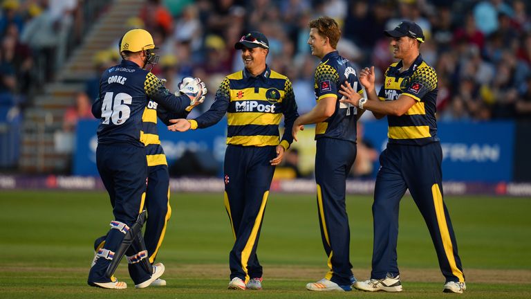 BRISTOL, ENGLAND - JULY 25: Craig Meschede of Glamorgan (2R) celebrates the wicket of Ian Cockbain of Gloucestershire in the the NatWest T20 Blast