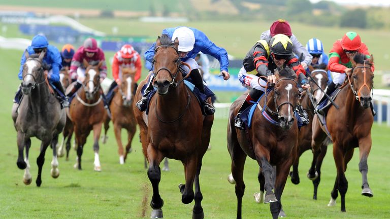 Global Giant (right) ridden by Fran Berry wins the Weatherbys EBF Stallions Maiden Stakes from Tribal Quest