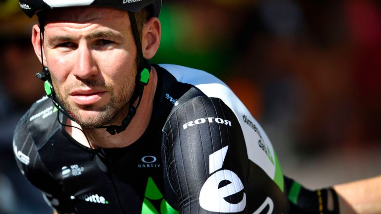 Great Britain's Mark Cavendish, injured, crosses the finish line after falling at the end of the 207,5 km fourth stage 