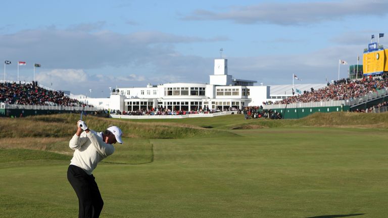 Greg Norman plays his approach shot to the 18th green at Royal Birkdale during the third round of the 137th Open.