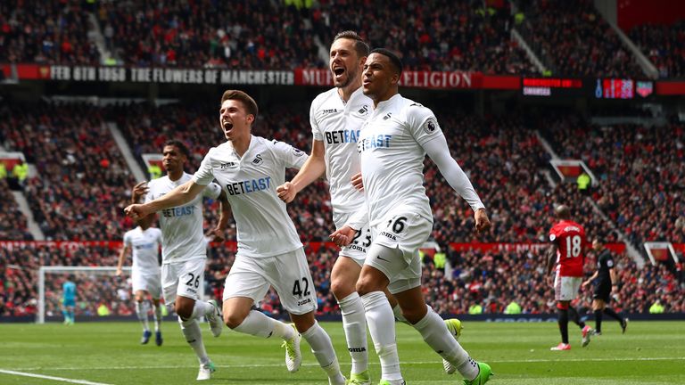 MANCHESTER, ENGLAND - APRIL 30:  Gylfi Sigurdsson of Swansea City celebrates scoring his sides first goal with his Swansea City team
