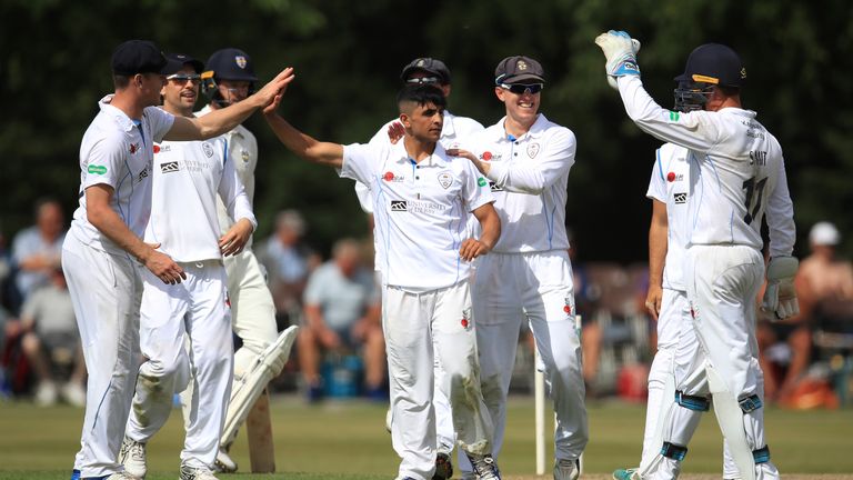 Hamidullah Qadri celebrates the wicket of Durham's Michael Richardson at Queen's Park