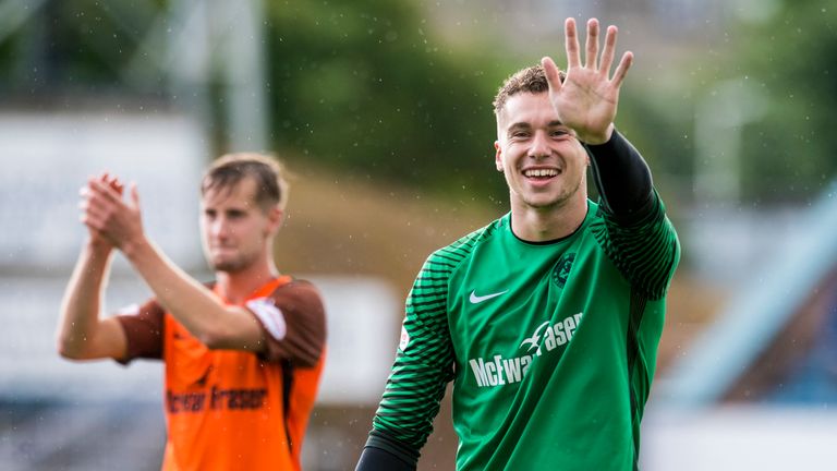 Dundee Utd goalkeeper Harry Lewis came up trumps in the penalty shoot-out