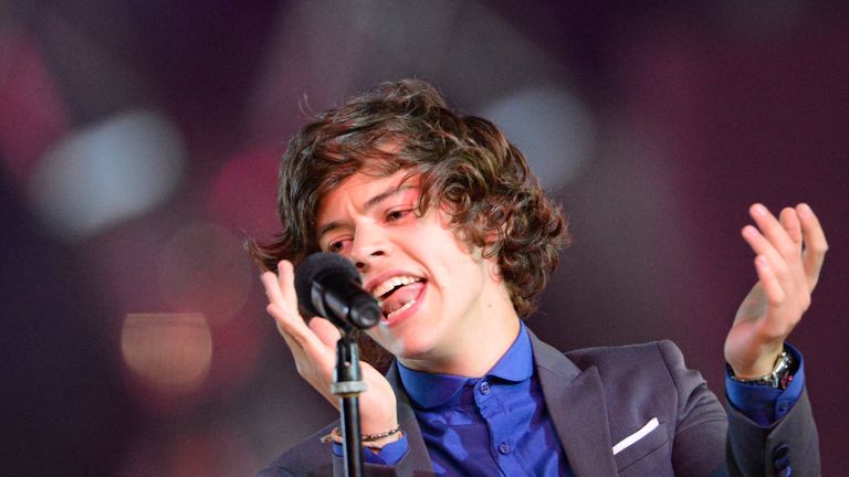 Harry Styles of the One Direction band performs at the Olympic stadium during the closing ceremony of the 2012 London Olympic Games in London