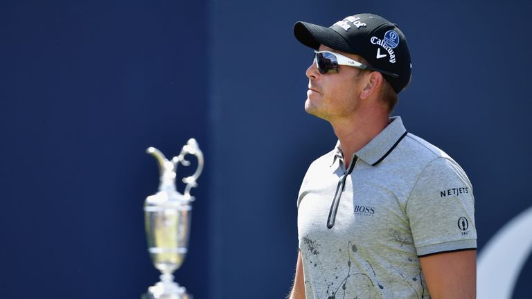 Henrik Stenson of Sweden walks onto the 1st tee during the final round of The 146th Open 