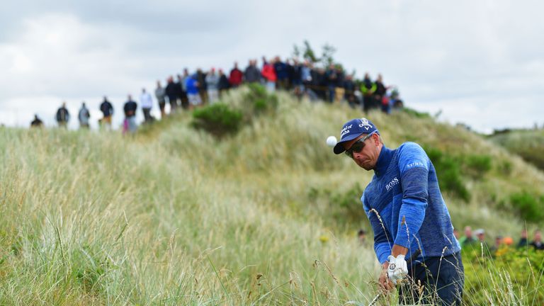 SOUTHPORT, ENGLAND - JULY 20:  Henrik Stenson of Sweden plays a shot from the rough on the 6th hole during the first round of the 146th Open Championship a