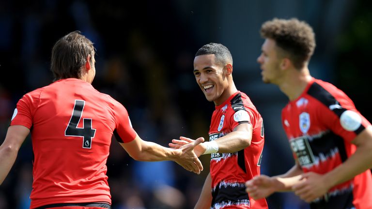 BURY, ENGLAND - JULY 16:  Tom Ince (C) of Huddersfield Town celebrates with teammate Dean Whitehead (L) after he scores his sides second goal during the pr
