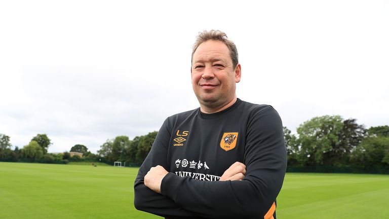 Hull City manager Leonid Slutsky poses for photographs after a press conference at the University of Hull Training Ground