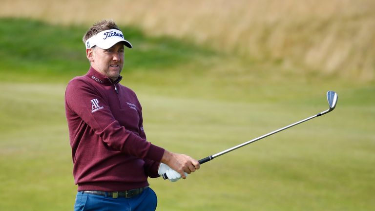 TROON, SCOTLAND - JULY 13:  Ian Poulter of England hits his second shot on the 13th hole during day one of the AAM Scottish Open at Dundonald Links Golf Co