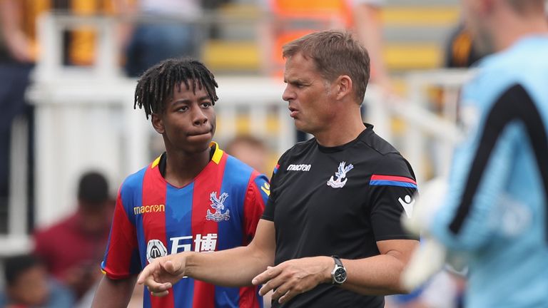 Crystal Palace manager Frank de Boer gives instructions to Jason Lokilo during a pre-season game at Maidstone