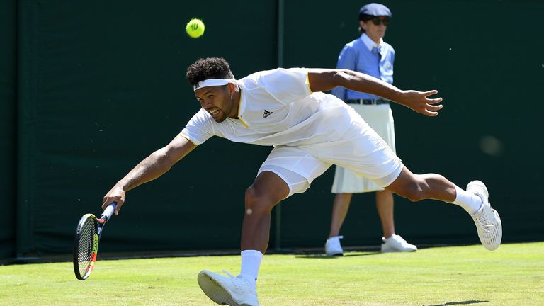 France's Jo-Wilfried Tsonga returns against Italy's Simone Bolelli during their men's singles second round match on the third day of the 2017 Wimbledon Cha