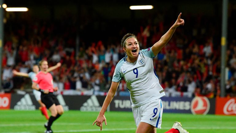 Jodie Taylor celebrates after scoring for England against France 