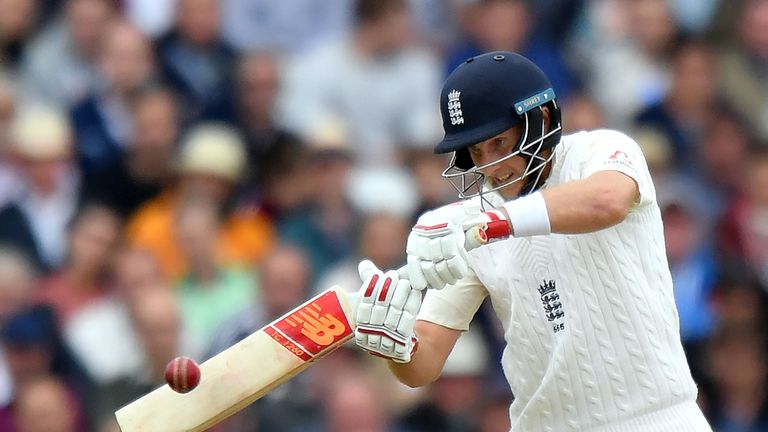 England's captain Joe Root hits a boundary against South Africa