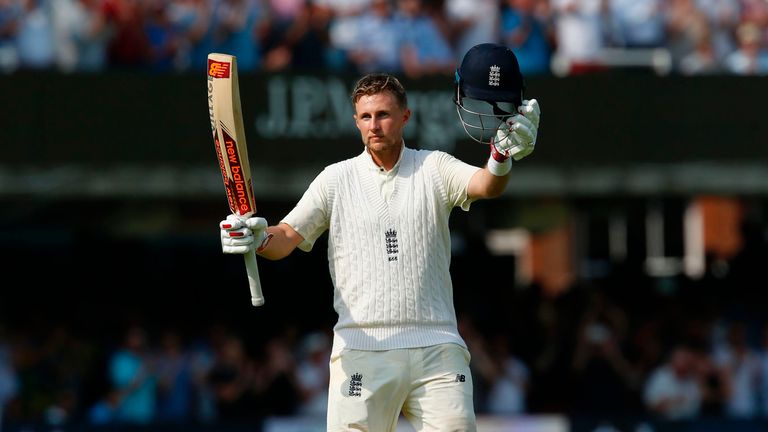 Joe Root celebrates after reaching his century on day one at Lord's