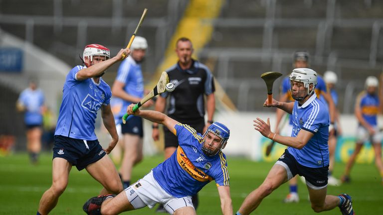 John McGrath of Tipperary in action against Cian O'Callaghan of Dublin