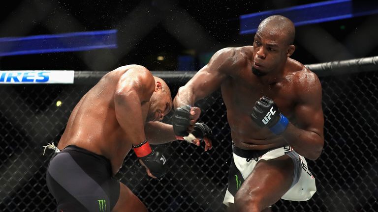 ANAHEIM, CA - JULY 29:  Daniel Cormier (L)  fights Jon Jones in the Light Heavyweight title bout  during UFC 214 at Honda Center on July 29, 2017 in Anahei