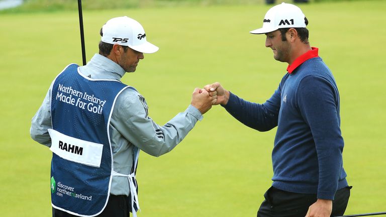 LONDONDERRY, NORTHERN IRELAND - JULY 09:  Jon Rahm of Spain celebrates an eagle on the 14th hole with his caddie during the final round of the Dubai Duty F
