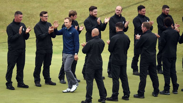 US golfer Jordan Spieth is applauded as he arrives to be presented with the Claret Jug, the trophy for the Champion golfer of the year after winning the 20